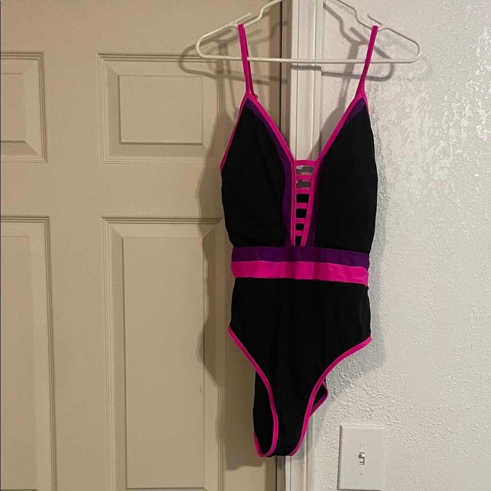 Black One-Piece Swimsuit with Pink Accents